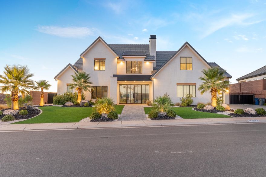 Welcome to this exceptional home located on one of the most prestigious and sought-after streets in St. George. Set in a quiet, private setting, this residence showcases breathtaking panoramic views that create a stunning backdrop for everyday living. Flooded with abundant natural light, the thoughtfully designed interior features high-end appliances, a spacious chef's kitchen with a large statement island, and elegant finishes throughout. The home also offers the rare convenience of two laundry rooms and a garage with epoxy floors.

The backyard features a spectacular 20x40 pool, premium turf, and ample space to relax and enjoy desert sunsets, seasonal fireworks, and dramatic storms rolling across the horizon. Inside and out, integrated surround sound enhances both daily living and entertaining, while a security camera system provides added peace of mind. This remarkable property seamlessly blends sophistication, comfort, and privacy in one of Southern Utah's most coveted locationsa rare opportunity to own a truly extraordinary retreat.