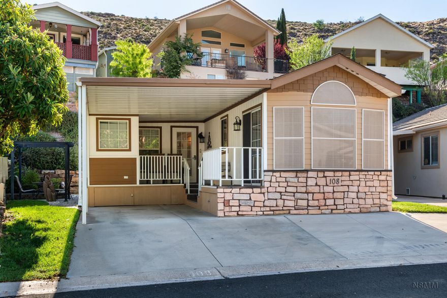 Turn-Key FULLY FURNISHED Desert Getaway Park Model 3 minutes from Quail Lake State Park. 680sf, 2 bedrooms, 1 bath. Ideal for a 2nd home or winter retreat. 1 car covered carport (14' x 17') and covered deck. On site amenities include clubhouse, outdoor pool, yard care, private road, putting green, small park, playground and pavilion. Since the streets are quiet, take yourself and your furry family member for a walk. Get to know your neighbors in Harrisburg Estates. BONUS: Under home 10' pull out drawers for additional storage, your fishing gear, tools and hobby items or whatever fits your talented needs. At Quail Lake, go boating, fishing, and swimming. You're only a 15 minute drive to Washington City and St. George.