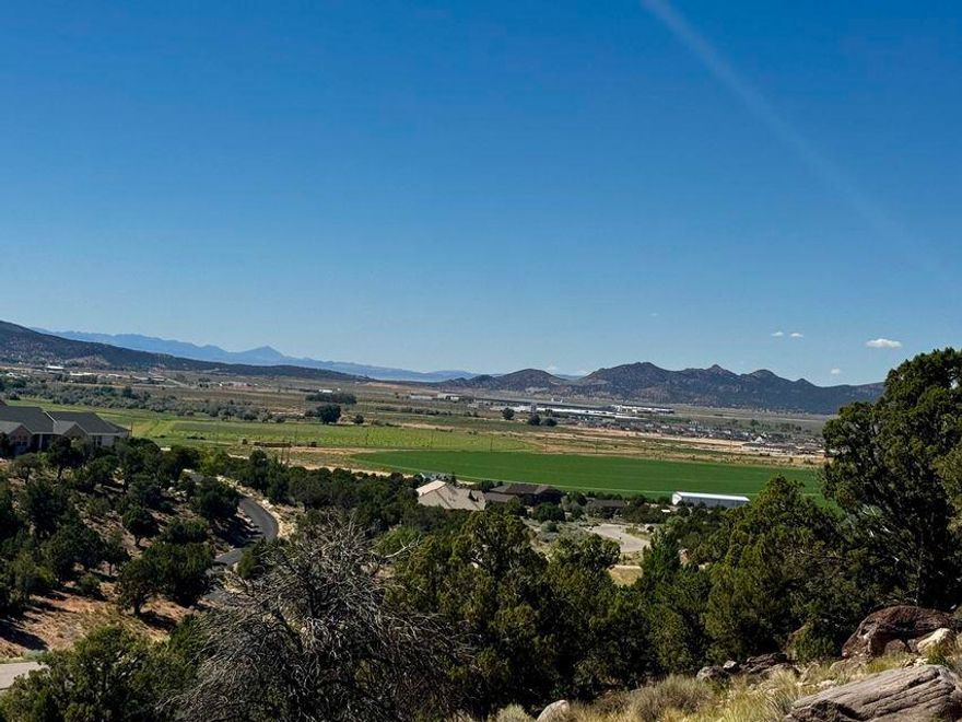 Discover the perfect place to build your dream home on this spacious 2.03-acre lot nestled in the desirable Northridge subdivision. Enjoy sweeping west-facing views—ideal for watching vibrant sunsets over the valley. The lot offers a peaceful setting with protective CC&Rs that preserve the integrity and beauty of the neighborhood while allowing flexibility for your custom build. With ample space for a shop, animals, or outdoor living, this property offers a rare blend of privacy and community in one of the area's most sought-after locations.