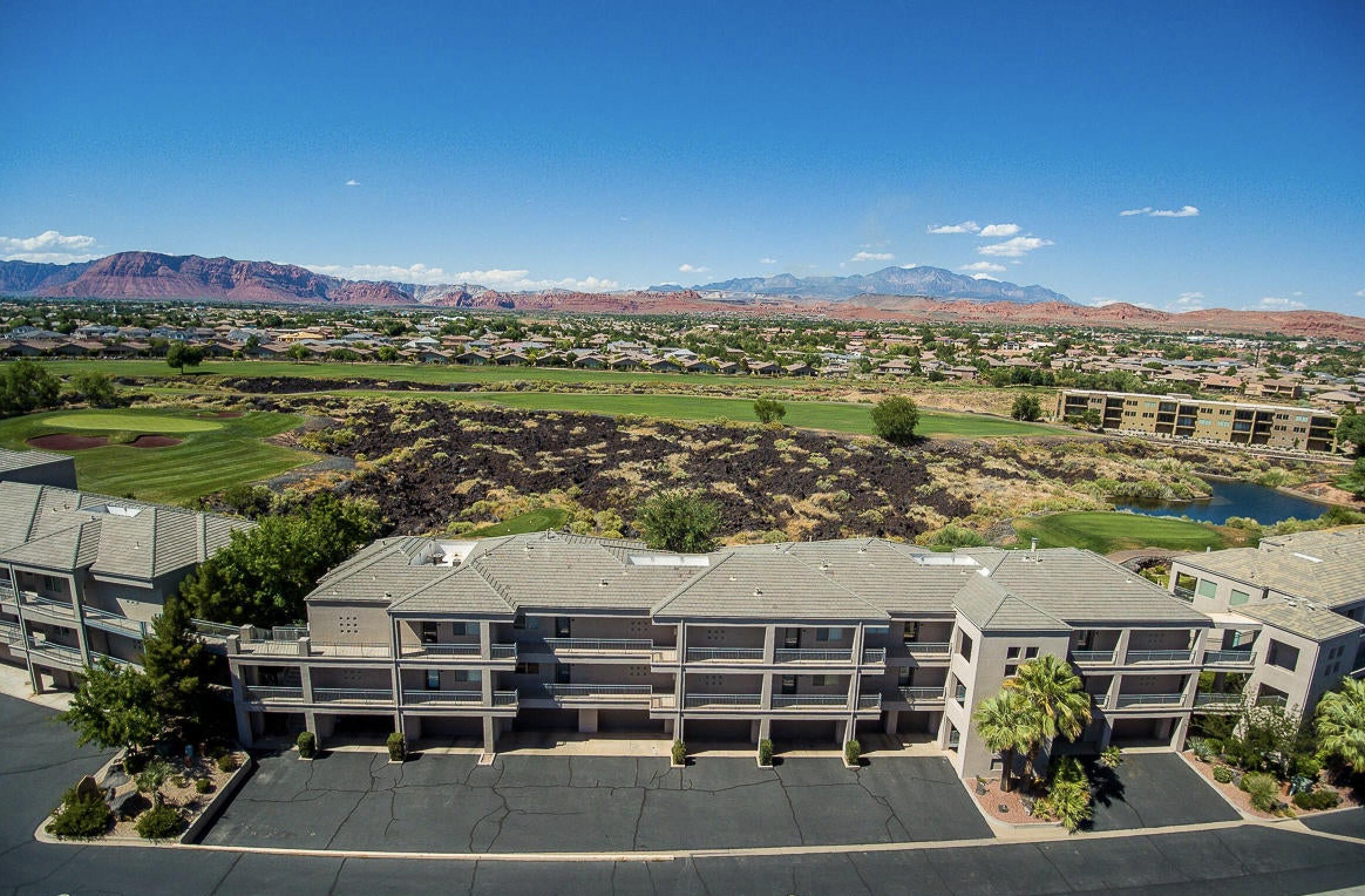 Experience breathtaking views of Sunbrook Golf Course and majestic Red Mountains from this stunning top level, end unit condo, nestled within the exclusive gated community of Black Rock Condos. With 3 spacious bedrooms, high end finishes throughout, this luxurious home is the epitome of luxury and comfort. Additional highlights include a 2 car garage with ample storage that includes a workbench and storage cabinets galore. Recent upgrades include a brand new AC unit, water heater and brand new carpet. Furnishings are included! Step outside and enjoy the breathtaking views on the oversized patio. Easy access to the unit with stairs and elevator. HOA amenities include clubhouse with indoor/outdoor pool, onsite property manager, gym and more!