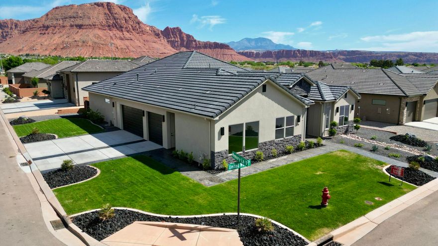 COMPLETED NEW CONSTRUCTION! Located in a quaint neighborhood, across from Unity Park, this home is situated on a corner lot. The floorplan is the ever popular S&S Homes, ''a home within a home:'' The attached casita includes a bedroom suite, separate living room, kitchenette, small laundry area, and private patio. GE CAFE appliances are a highlight of the main kitchen, and the home has a beautiful iron door. Close to trails, Tuacahn Amphitheatre, Snow Canyon, and Gunlock Reservoir