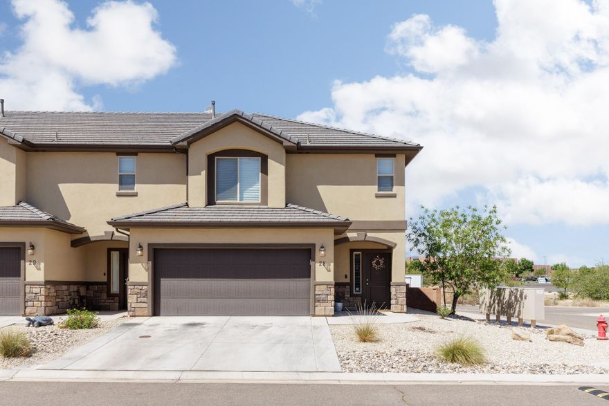 Welcome to your cozy home in the heart of St. George, UT! This beautiful 3-bedroom, 2.5-bath residence combines modern comfort with elegant design. Upon entering, you'll be greeted by a spacious living area with natural light and seamless access to the dining and kitchen spaces. The kitchen features, stainless steel appliances, and ample cabinetry. Upstairs, the primary suite offers a private retreat with an en-suite bath and large walk-in closet. Two additional bedrooms provide generous space for family or guests. Enjoy outdoor relaxation on the private patio, perfect for entertaining. With a 2-car garage and proximity to local amenities, this home perfectly balances convenience and tranquility.