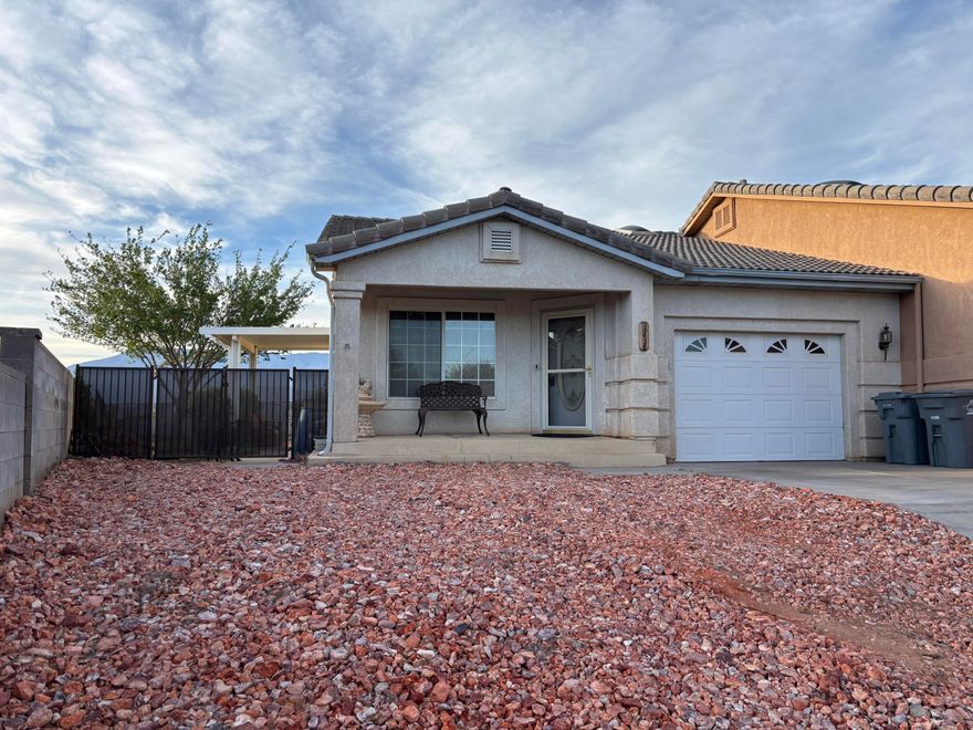Separately owned twin home. Fully fenced large backyard with views of Pine Valley mountain and hurricane mesa. New HVAC units, new microwave, new water heater, and upgraded kitchen cabinets. Vaulted ceilings. Quiet neighborhood with no HOA dues.