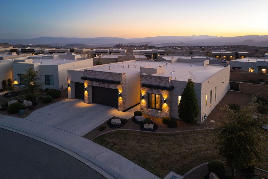 Luxury Living in The Ledges - Fully Furnished with Snow Canyon Views.
Experience elevated desert living in this pristine 4-bedroom, 4-bathroom home located in the Ledges. Impeccably maintained and offered fully furnished, this residence is truly move-in ready, combining comfort, style, and exceptional outdoor living. Inside, the home features a spacious open-concept layout filled with natural light, high-end finishes, and thoughtfully designed living spaces. Step outside to one of the largest backyards in the neighborhood, perfectly positioned to capture breathtaking views of Snow Canyon. Located just minutes from championship golf, hiking and biking trails, dining, and recreation, this exceptional property blends luxury, convenience, and the stunning natural beauty of the Ledges.