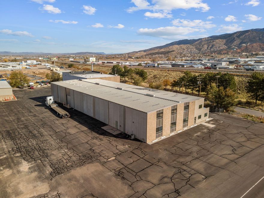 16,306 sq ft warehouse on 2.69 acres of asphalt available for lease at $0.75 per square foot per month. Amazing I-15 visibility and less than .5 mile from the nearest exit. There is over 3,000 sq ft of office/showroom space and a an addition 3,000 sq feet of mezzanine space. 3 semi docks and 3 garage doors. Plenty of power and all city utilities. Located in the heart of town and on the newly renovated industrial road. Perfect for manufacturing, storage, logistics, existing or new businesses and more!