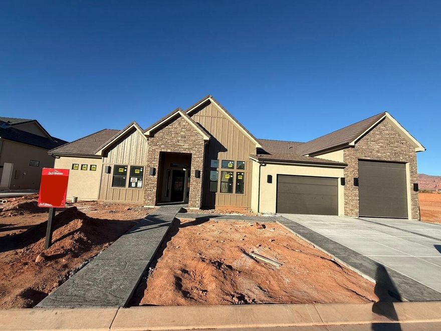Gorgeous gable-style home: Large lot, 20x40 pool, giant slider in the great room, beautiful view, epoxy garage floor, wired for surround in the great room, and a 42.8 ft deep RV garage with RV parking on the side. The floor plan is open and light. The finishes are high-quality and beautiful: stunning iron door, combo of painted and knotty alder cabinets, gorgeous quartz countertops, GE CAFE appliances, and Delta plumbing fixtures. Close to hiking and biking trails.