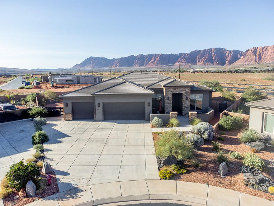 Come see this beautiful 4-bedroom, 2.5-bathroom home in Ivins with an open floor plan designed for both comfort and entertaining. The home is filled with natural light from large windows that perfectly frame breathtaking views of the Red Mountain right from your backyard. The expanded master suite offers a spacious retreat, while the large lot provides room to enjoy the outdoors and take in the scenery. With its bright, welcoming interior and incredible setting, this home combines functionality with stunning surroundings, making it the perfect place to live in the heart of Ivins.