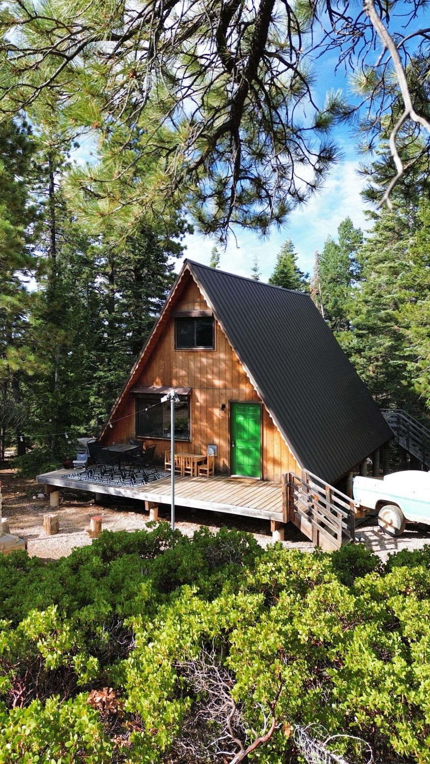 Escape the heat and unwind in this beautiful A-frame style cabin, just 4 miles from Navajo Reservoir. Blending comfort and adventure, this mountain retreat is the ideal getaway.

Step onto the expansive deck and take in the stunning views, or gather around the outdoor fire pit under the stars. Inside, you'll find thoughtful upgrades, including a new water heater, an upgraded solar system, and a full-home generator that ensures you'll have all the power you need, anytime.

A water trailer is included for hauling water to the cabin with ease from a freshwater spring nearby. 

With its cozy charm, modern amenities, and breathtaking surroundings, this property is more than just a cabin—it's a family retreat designed for making memories.

Call or text Jase Langston for more info