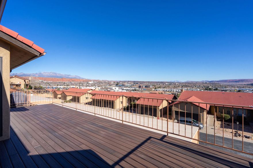 Stunning Views in the Heart of Downtown. Experience the perfect blend of scale and scenery in this expansive 3-bedroom, 3.5-bathroom urban retreat. Spanning nearly 2,500 square feet, this residence offers a rare sense of space and privacy with a dedicated ensuite for every bedroom. Take in breathtaking, panoramic views of the downtown skyline and the iconic Red Mountains from two oversized decks, recently updated with premium, low-maintenance Trex decking. Perfectly positioned for a vibrant lifestyle, you're just steps from downtown's best dining and entertainment with seamless freeway access for an easy commute.