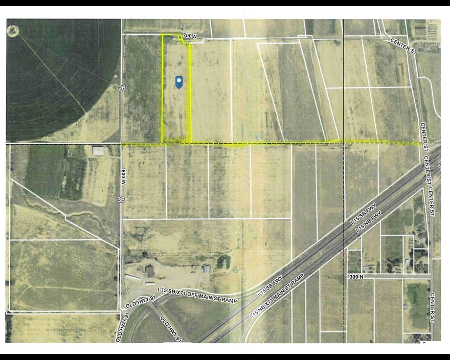 10.18 acres with water Right off I-15 in Summit. Endless potential. All useable. Possible seller financing. Can be combined with 13 acres next to it. Call for details.