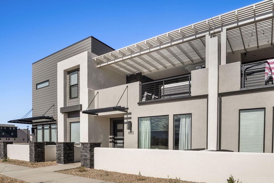 Own in one of the fastest growing cities with this prime vacation rental in Desert Color. Located steps from the 2.5-acre lagoon, one of So. Utah's only lagoons of this size. This home offers bright, modern living with a flexible layout ideal for guests or personal use. It's being sold fully furnished with quality furnishings and unlike other rentals it is dog friendly.  This rental is truly turnkey, with reservations currently on the books. Enjoy resort-style amenities including pools, pickleball, clubhouse, dining, and miles of trails. And with the new Desert Color commerce, dining & entertainment coming soon, your experience here is about to be elevated even further. With a strong rental demand, lifestyle appeal, and long-term upside potential, this is a rare opportunity.