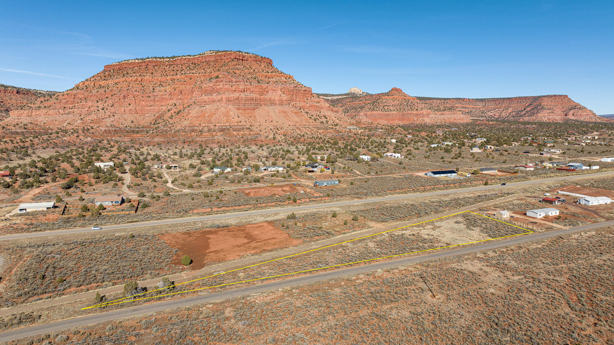Here is a slice of paradise nestled amidst the breathtaking scenery of Kanab! This remarkable 1.17-acre parcel offers awe-inspiring views of the majestic red cliffs, creating a picturesque backdrop for your dream home or business venture. Convenience at Your Fingertips: Water is hooked up and electric is ready to hook up, this lot is primed and ready for your vision to come to life. Versatile Building Options: Whether you're envisioning a cozy stick-built home, a stylish manufactured residence, or a thriving commercial enterprise, this property caters to your diverse needs. Endless Possibilities: With C-1 commercial zoning, the potential for entrepreneurial success is limitless. Embrace the opportunity to establish your dream business in a prime location with unrivaled views. Don't miss out on this extraordinary opportunity to own a piece of Kanab paradise! Near Zion, Grand Canyon and Bryce National parks Contact us today to seize your chance to turn dreams into reality. Buyer to Verify All