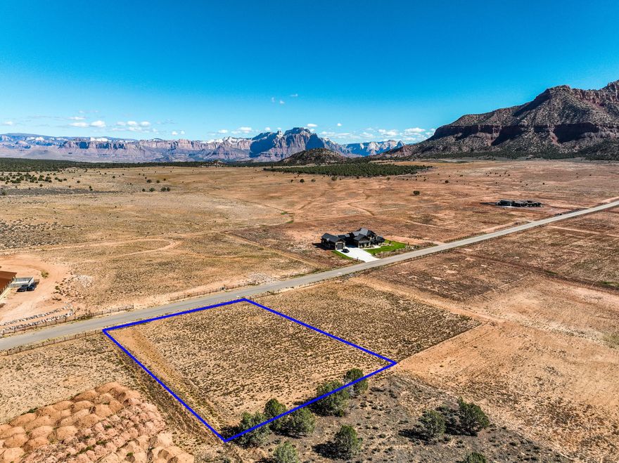Discover 1.98 acres in the prestigious Wells Estates of Apple Valley, offering panoramic views of Zion National Park and striking red rock vistas. With paved roads, excellent access, and ample space for your custom estate, this property is the perfect canvas to create the dream home and lifestyle you've envisioned.