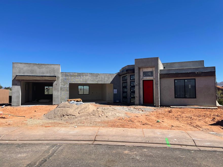 Modern 4-bed, 4-bath home with a walkout basement, located near Sand Hollow Resort. Enjoy sleek design, open living spaces, and stunning views in a prime location—perfect for relaxing or entertaining in Southern Utah's adventure hub.