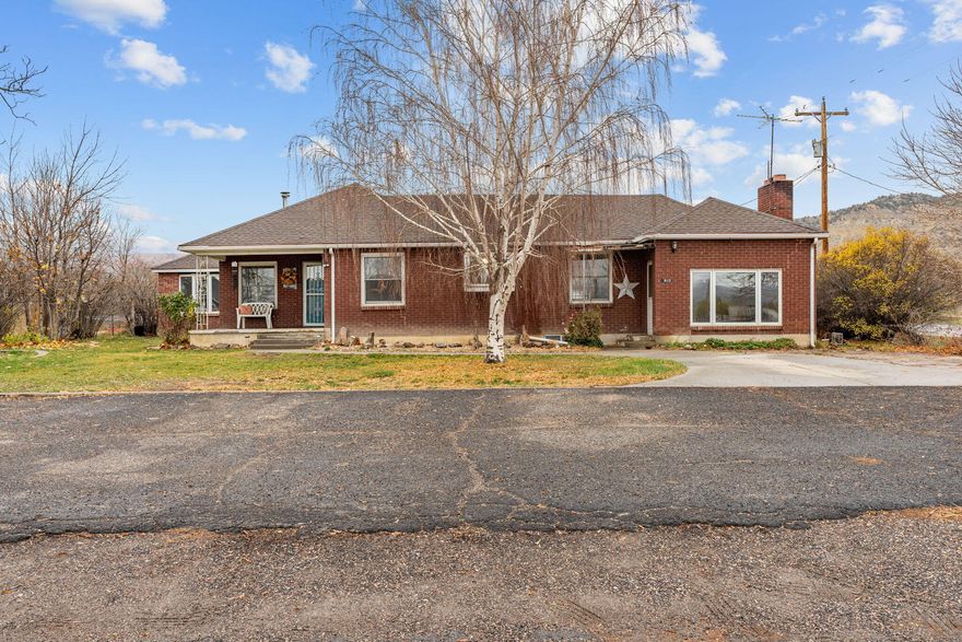 Charming Brick Home in Tropic, Utah - Near Bryce Canyon National Park!
Enjoy small-town living surrounded by incredible scenery in this darling brick home on a corner lot in beautiful Tropic, Utah. Featuring 3 bedrooms and 2 baths, this home offers a remodeled kitchen and plenty of charm throughout. Some areas could use your personal updates — a great opportunity to make it your own!

Take in breathtaking views from the front porch of the Pink Cliffs and Escalante Mountains, with striking red rock vistas out back toward Bryce Canyon. Located in the upper part of town, right next to the elementary school and just minutes from the high school. The property includes a separate workshop with power, ideal for storage or projects, plus mature fruit trees and a spacious .35-acre lot. A 300 sq ft basement provides excellent cold storage.

Don't miss your chance to own your own place with endless potential and unbeatable views!