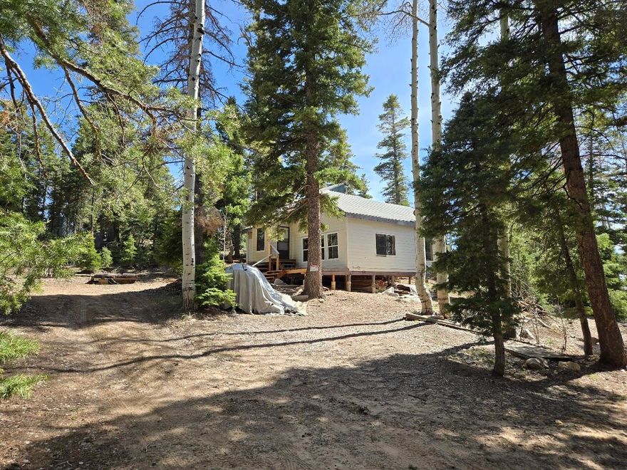 Handyman Special | Off-Grid Mountain Cabin - Navajo Estates, Duck Creek Village, UT
Priced to Sell at $154,900!
This 1-bedroom (easily convertible to 2) off-grid cabin with large loft and 1 bath sits on 0.51 acres in desirable Navajo Estates.
Key Features:
New siding, new windows, new furnace, and 12x32 1-car garage/shed
1,000-gallon water tank + finished plumbing
Great working wood stove
Fully wired - runs on Solar, Generator & Propane
Septic system installed
Fresh water spring just 2 miles away
Location & Lifestyle:
Nestled in the heart of Duck Creek Village, this property is just minutes from beautiful Navajo Lake -- a premier destination for trout fishing, boating, and camping. Enjoy world-class trail riding with direct access to extensive ATV, UTV, horseback, and hiking trails. Surrounded by towering pines and mountain scenery, this is true Southern Utah mountain living.
Seasonal access, no public utilities. Perfect for handymen, contractors, or anyone seeking a private mountain getaway or weekend retreat.
Preferred Lender: Ryan Bolton - Patriot Mortgage (flexible lending options available)
Bring your finishing touches and make this mountain cabin your own!
Buyer and Buyer Agent to verify all information