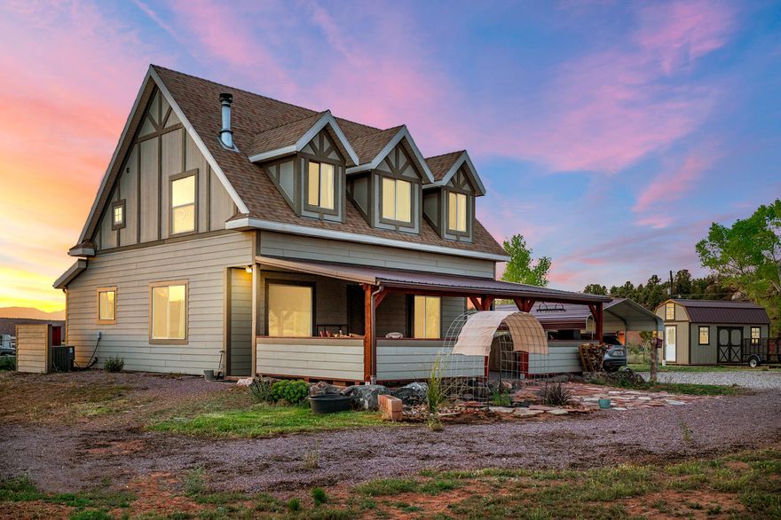 Welcome to a place where the pace slows and the views stretch endlessly across Southern Utah's stunning landscape. Nestled in the quiet beauty of Apple Valley, this lovingly maintained home invites you to breathe deeper, relax longer, and truly feel at home. Each day begins with mountain vistas painted in morning light and ends with unforgettable desert sunsets. With over an acre of land, the backyard becomes your personal retreat. Imagine gatherings under open skies, evenings by the firepit, space for gardens, play, or simply the luxury of room to roam. Inside, natural light pours into warm, comfortable living spaces designed for both connection and quiet moments. Every room feels welcoming, creating an atmosphere that is as peaceful as the surroundings. This is more than a home - it's a lifestyle of space, serenity, and spectacular scenery.