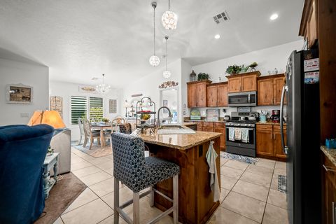 Tiny photo for 328 E Desert Gardens LN, Ivins, UT 84738 (MLS # 26-270272)