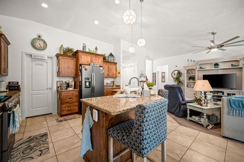 Tiny photo for 328 E Desert Gardens LN, Ivins, UT 84738 (MLS # 26-270272)