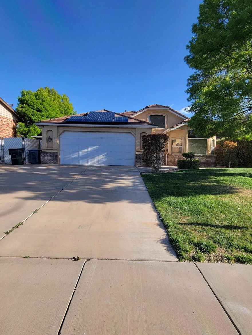 No HOA fees. Beautiful custom home in the heart of St George century located. Solar panels. This home has 2 in wood blinds, just updated with new mohawk wood floors. new water softener, new dishwasher, new gas stove top, new slimline microwave,4 lazy Susans in the kitchen, coffered ceilings, new ceiling fans, new kitchen and bathroom faucets, new toilets, covered RV parking, with 30-amp RV service and RV dump. Updated Front automatic sprinkler system, back sprinkler system, mature landscaping. Oversized garage, central vacuum. large bedrooms. The storage room off the garage could be used for an office or craft room the room has heat and air to it. storage shed-lots of storage throughout. Gorgeous Red Rock Mountain view off of the back covered patio This is a must-see home.