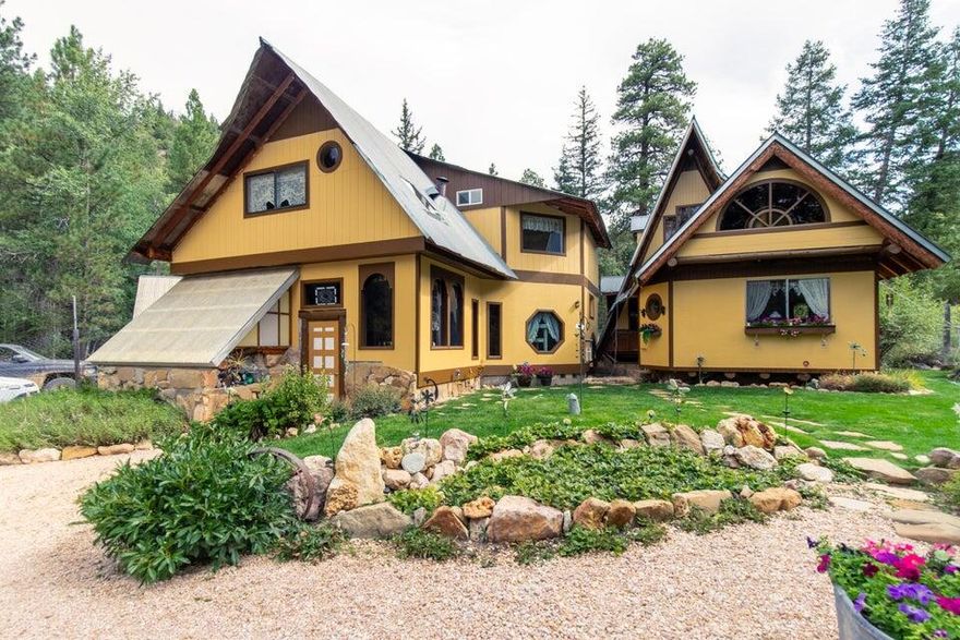 This cozy 2 bed, 1 bath cabin sits on 20 private acres with animal rights. stunning canyon views and a seasonal creek running through the property. Full of vintage charm and rustic character, the home features an inviting living area with a wood burning stove, a darling kitchen with classic details, and warm wood finishes throughout. Enjoy off-grid peace of mind with a 1/4 share of water and a diesel generator included. The property also features a chicken coop, storage shed, additional outbuilding, and partial fencing-perfect for animals, hobbies, or future use. Whether you're looking for a peaceful retreat, a getaway with potential, or a unique place to make your own, this cabin is a rare find in a beautiful Southern Utah Setting.