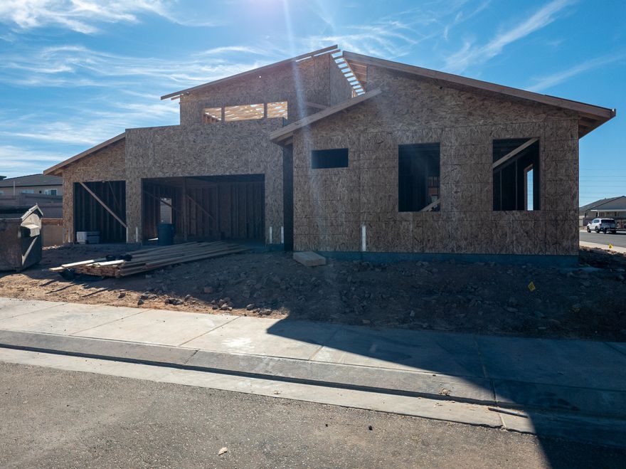 New Build in a non-HOA area featuring a flexible 1 Bedroom suite with its own kitchenette, living room, and full bath. The layout works well for multi-generational living, a guest space, home office, or potential STR/ADU use (buyer to verify local regulations and permitting). The main home offers large spacious gathering areas on both floors with main level living. Includes large deck that has beautiful views of Zion and Pine valley Mountain. This home will be finished with clean, modern finishes, efficient storage, and bright, comfortable living areas. Depending on timing, the buyer may still choose certain finishes. Call today to set up an appointment. Buyer to verify all information, including city requirements to short term rent the ADU. 

Builder estimates completion to be around the end of January