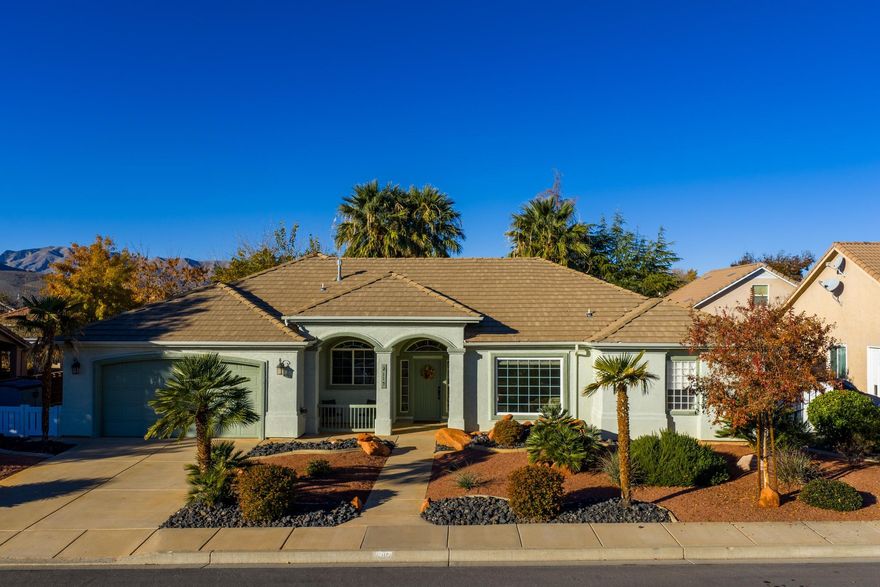 Exceptionally maintained property built in 1998 on a spacious .23-acre lot. The home features a 2,200 square foot split-floor plan with three guest bedrooms, a primary suite, and two bathrooms. A vaulted covered front entry welcomes you inside to a formal living room, formal dining room, and a warm, inviting family room with gas fireplace. The kitchen showcases an island, oak cabinets, tiled floors, and granite counters.  Experience the comfort of a covered and shaded backyard patio, conveniently accessible from both the family room and the primary bedroom.  The backyard is fenced with both the front and backyard professionally re-landscaped for water conservation and low maintenance.  Other notable features are a two-car-attached garage with built-in storage and no HOA and move-in ready!