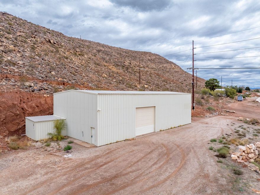 Welcome to 555 E Nichols Peak Rd—a rare opportunity to own 3.29 acres in the heart of Washington Fields. Perfectly positioned with stunning panoramic views. This Residential/Agricultural (RA-2) property offers exceptional privacy, versatility, and room to create something truly special. Bring your horses, build your dream home, or design a private estate, hobby farm, or retreat. The parcel offers a mix of usable ground and gentle slope, providing elevated views and multiple build-site possibilities. A major asset is the impressive 3,228 sq. ft. metal outbuilding (built in 2006), featuring a 40' x 80' shop with 25-ft ceilings, plus a private office and bathroom—ideal for equipment storage, a workshop, or business operations. Located in the desirable Dixie Power service area. No HOA. Opportunities of this size, location, and flexibility are extremely rare in Washington Fields. Buyer to verify all information.
Here is the direct link to the zoning: 
https://codelibrary.amlegal.com/codes/washingtonut/latest/washington_ut/0-0-0-5850