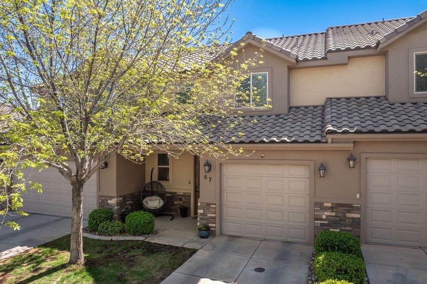 MOVE IN READY, gorgeous townhome in the Bristol Park Townhome community.  This 3 bedroom, 2.5 bathroom open floor plan with its abundance of natural light and vaulted ceiling provides an ideal space for unwinding, entertaining and everyday living.  Thoughtful upgrades include; wood-planked look LVP flooring, carpet, interior paint throughout & a large walk-in shower with bench & shelf space in the primary bathroom.  The kitchen and dining room blend seamlessly with the great room.  In the kitchen, enjoy granite countertops, a large sit-at island, plenty of storage & large pantry ~ ideal for any chef.  The large primary bedroom with its built in window seat & storage, updated ensuite shower & walk-in closet create a quite escape for relaxation.
Outdoors, you'll find your own fully fenced backyard with its own vegetable garden ~ perfect for relaxation & entertaining alike. The attached one car garage includes shelving/bench space and parking is available on the driveway & guest parking spaces throughout the community for your guests.  

Close to Sand Hollow & Quail Creek Reservoirs, Zion National Park, world-class hiking, biking and all that Southern Utah offers for the outdoor enthusiasts.   Come experience this wonderful townhome for yourself ~ you don't want to miss this one!