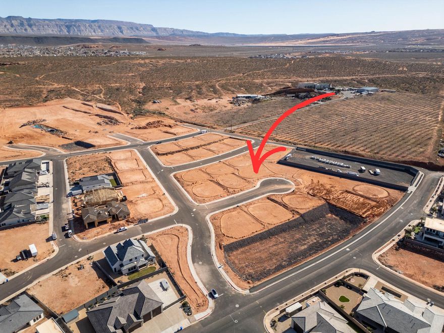 Subdivided lot in a new section of Sand Hollow Village subdivision. Bring your builder and build the home of your dreams!
