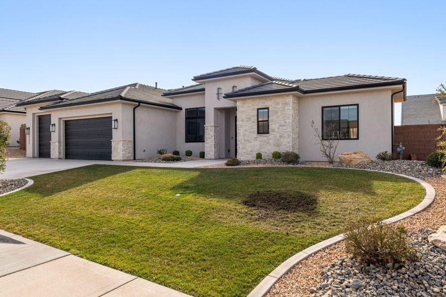 *Desert Living with Space for the Toys*

Set in Desert Canyons near the Arizona line, this well-designed Jared West-built home combines open living spaces with thoughtful details throughout. Inside, 10-12 ft ceilings, 8 ft doors, and warm engineered hardwood floors create a bright, comfortable feel. The kitchen is built for both cooking and gathering, featuring stainless Bosch appliances, double ovens, quartz countertops, custom cabinetry, a large island, and a butler's pantry for extra storage and prep space. The great room stays light and welcoming with built-ins, a gas fireplace, and views into the landscaped backyard. A split floor plan adds privacy, while the oversized boat garage with epoxy floors offers plenty of room for vehicles, toys, and gear. Located just minutes from scenic hiking trails and outdoor recreation, this home delivers the space, comfort, and freedom that make Southern Utah living so appealing. No HOA.
