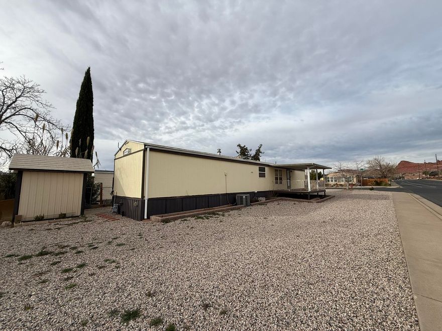 This large corner lot with NO HOA and major RV parking is a rare find & listed $6,000 under recent appraisal!
Large .17 acre lot currently has a 2 bed/2 bath modular home with shed, RV hookups, & washer/dryer.  Ready to go as a rental property or remove the home and replace with another compliant home!

Property is being offered AS-IS, buyer to verify all.