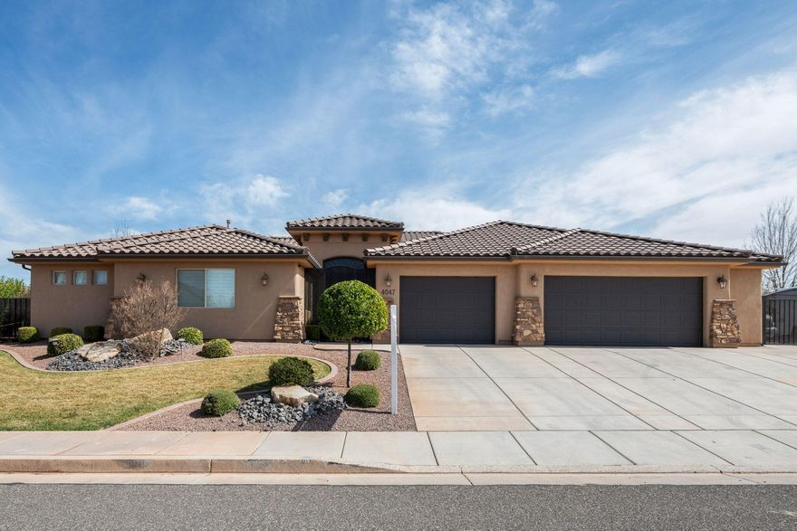 Welcome to this beautifully maintained home in Sugar Plum, offering a thoughtful design, and stunning southern Utah surroundings. This home features an inviting open floor plan with large windows that fill the home with natural light and frame the peaceful views of the neighborhood. At the heart of the home, you'll find a beautifully appointed kitchen with modern finishes, a large island, and seamless flow into the dining and living areas. The primary suite is generously sized with a spacious walk-in shower and walk-in closet. One of the outstanding features is the attached casita, complete with its own full-size refrigerator, sink, dining area with patio access, washer and dryer, private bedroom, and full bathroom, creating an ideal setup for guests or extended family. Step outside to enjoy a fully fenced and landscaped yard, covered patio, and RV parking with electrical hookups and sewer clean out. The location is near the soon to be Wheels Park, freeway access, Warner Valley and top-rated schools.