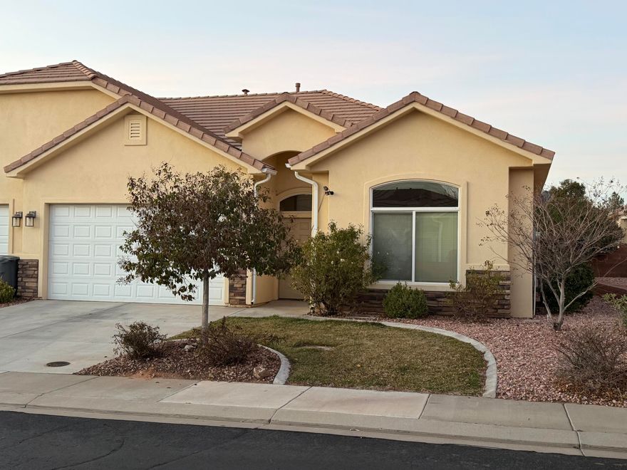 Immaculate 3-bedroom, 2-bath twin home built in 2017 and very lightly lived in. Pride of ownership shows throughout with minimal wear and tear and excellent overall condition. This thoughtfully designed 1,240 sq ft floor plan offers an upgraded kitchen with granite countertops, quality cabinetry, and manufacturer hardwood flooring in the main living areas.

The spacious primary suite includes a well-appointed en-suite bath, while two additional bedrooms provide flexibility for guests or a home office. The adjacent unit connects only at the garage, primary bath, and a secondary bedroom, offering privacy while maintaining the convenience of twin home living.

Enjoy a fully fenced backyard in a quiet neighborhood setting. Ideally located near outdoor recreation, including golf at Sky Mountain and quick access to Sand Hollow. Low-maintenance living in a desirable Hurricane location.