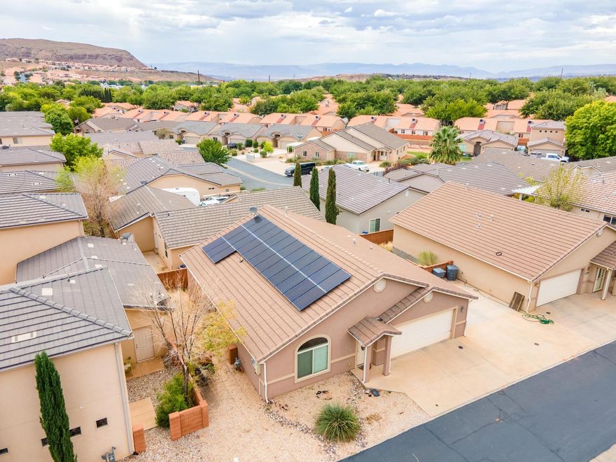 This charming 3-bedroom, 2-bathroom home offers comfort, efficiency, and an unbeatable location. Situated in the quiet, peaceful neighborhood of English Oaks, you'll enjoy low monthly utility bills thanks to the solar panels. The refrigerator is included, and the home features a 2-car garage with additional extra parking on the side, complete with 110V power for all your adventure needs. The community HOA enhances your lifestyle with a clubhouse, pool, front-yard maintenance, and hot tub. Just minutes from shopping, dining, schools, and quick access to I-15, this property combines convenience with tranquility. With a motivated seller, this is an excellent opportunity to own a well-maintained home in a sought-after neighborhood. Don't miss out, schedule your showing today. Long term rentals are allowed!