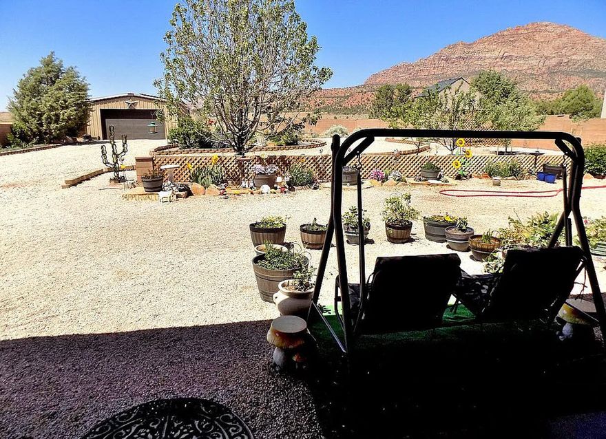 Unblockable views of Pine Valley mountains ,Canaan mt. and Smithsonian butte. 5 bed,3 bath,1/2 acre with upper balcony Incredible views!! 24x24 insulated shop w/220v and 9kw grid tie owned solar. Shop has commercial racks. Deep 2 car garage in front. Full block wall with iron gates. Dog run/ chicken pen. Irrigation front and back with garden and fruit trees. A nice size garden shed and Rv parking w/water and 50 amp. Large hot tub room off master and back porch all glass. New pellet stove. Home has commercial grade smoke and fire detectors. Both HVAC units have been fully serviced and new contactors/capacitors. New hot water tank. New pellet stove, Fully landscaped front/back with large shade trees. Kitchen remodeled with custom brass and porcelain pulls and glass backsplash. New paint and carpet. Smart thermostat and ring doorbell. 2 beds and 2 baths downstairs, 3 beds 1 bath upstairs plus great room. Comes with all appliances including new LG washer/dryer. World class mountain bike trails and an mx track blocks away. Hiking and ATV trails everywhere close. 10 degrees cooler than St.George in the Summer! Great stargazing and lots of wildlife. Very Quiet,clean and Friendly neighborhood.