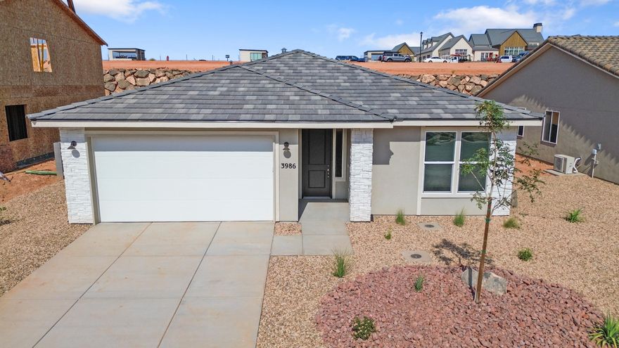 Quick move in! Rates as low as 3.99%  Fixed  at no cost to the buyer. Find your dream home at Cordero! Nestled between Copper Rock and Southern Shores, this exciting Hurricane community offers impressive desert and mountain scenery, with ample outdoor recreation opportunities at nearby golf courses and Sand Hollow State Park. Right off Southern Parkway, residents will enjoy easy access to the shopping, dining, entertainment and employers. The neighborhood showcases an inspired array of designer-curated homes, each boasting a flexible layout and the in-demand features today's homebuyers are seeking. The home includes a fireplace and covered patio. Buyer to verify all information.