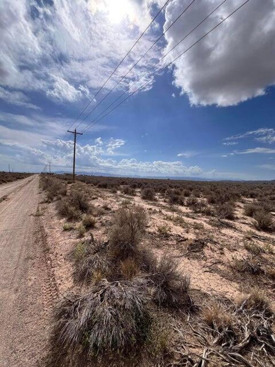 Dreaming of wide open skies, no neighbors, and your own slice of desert freedom? These 2.03 sunny acres in Modena, Utah could be your off-grid getaway or future homestead. Located in the quiet Escalante Valley, this flat lot is sprinkled with desert brush and comes with a bonus: power poles already on-site! No HOA, barely-there property taxes (about $25/year), and plenty of peace and quiet. Camp, build, or just stare at the stars. it's the ultimate ''get outta town'' card. Adventure, privacy, and big sky vibes—right here on Lots 1 & 22.