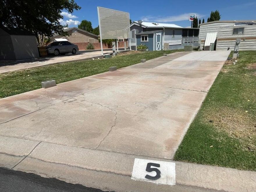 Amazing lot in one of the most established RV resorts in Southern Utah!  Desirable owned lot in beautiful Canyon Breeze 55+ RV park. Enjoy all the benefits of living in one of Southern Utah's senior RV communities. Perfect as a winter or vacation getaway spot. Canyon Breeze is in a wonderful location near shopping, restaurants, and walking/biking trails. HOA includes Clubhouse; Common Area Maintenance; Garbage; Outdoor Pool; Private Road; Water; Yard - Partial Maintenance