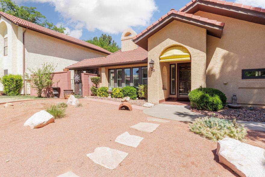 Welcome to this clean, comfortable townhome, with new HVAC in 2021, featuring a Kitchen with stainless appliances, granite, freshly painted cabinets and pantry storage. Relax in the great room with vaulted ceilings and a fireplace, vinyl flooring and plantation shutters. This home has a second bedroom that can be set up as an office or guest room with the murphy wall bed. Two fenced and covered patios on the north side of the home have privacy, a storage shed and turf to offer convenience. The detached garage features keyless entry and cabinets for storage. In 2021, all polybutylene piping was replaced as a preventative measure. Rentable, some restrictions. Location is near the hospital, retail, restaurants and downtown St George. Easy access to I-15. Glass top table with four chairs and great room accent table is conveyed with sale. Garage tools stay for buyer convenience or can be removed.