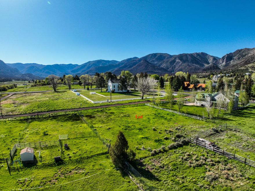 Rare opportunity in one of Pine Valley's most desirable locations. This .46-acre flat lot is located just west of the historic Pine Valley Chapel and offers stunning mountain and valley views. Flat, buildable land in Pine Valley is extremely rare--especially in a location this prime.
The property is fully fenced and includes two Pine Valley water hookups, a major benefit for future construction. It has already been perk tested saving a buyer both time and expense. Much of the upfront work is already done, making this lot truly stand out.
Surrounded by quality homes and Pine Valley's natural beauty, this property offers peaceful mountain living with easy access to hiking, biking, and year-round recreation. The setting combines open space, privacy, and the historic charm Pine Valley is known for.

Opportunities like this do not come along often. Flat lots in Pine Valley are rare, and finding one with water connections, testing completed, and this location is even more uncommon. Whether you are planning a primary residence, a second home, or a long-term investment, this lot offers exceptional value in one of Southern Utah's most sought-after mountain communities.