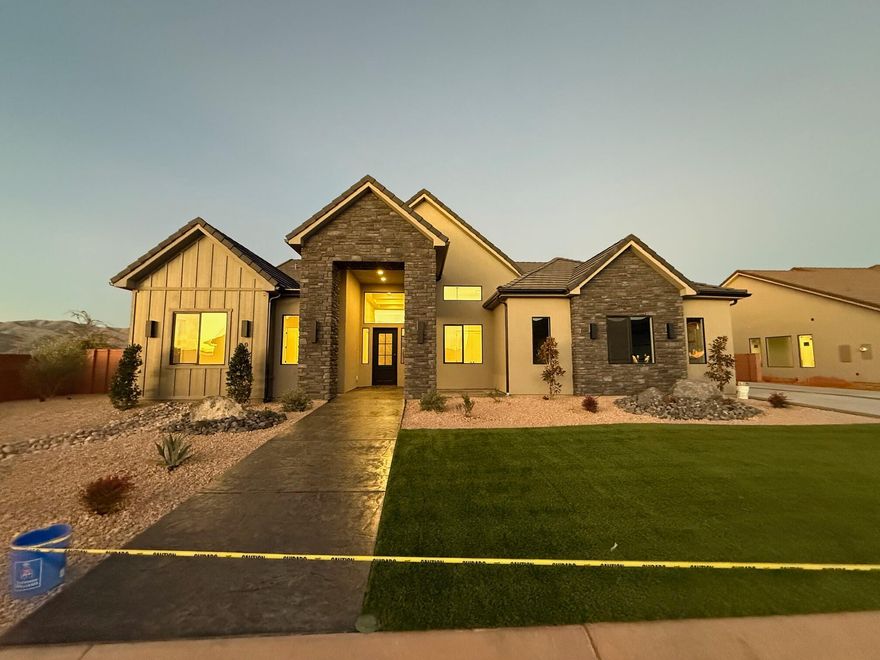 Gorgeous gable-style home: Large lot, giant slider in the great room, , casita, a view, epoxy garage floor, wired for surround in the great room, and a 41.7 ft deep RV garage with RV parking on the side. The floor plan is open and light. The finishes are high-quality and beautiful: stunning iron door, combo of painted and knotty alder cabinets, gorgeous countertops, GE CAFE appliances, and Delta plumbing fixtures. Close to hiking and biking trails.