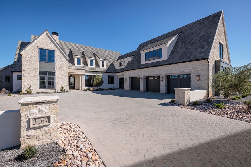 Designed and built by Christensen Homes, this new home offers an incredible floor plan highlighted by head-to-toe premium finishes and fixtures. Oversized windows flood this home with natural light and stunning views. The kitchen is equipped with Professional Wolf and Subzero appliances, natural Quartzite countertops, and designer fixtures, ready to host! Enjoy natural limestone, marble, plaster, and white oak finishes throughout. With 7074 square feet, 6 bedrooms, 7 bathrooms, multiple family/entertaining rooms, multiple laundry rooms, this home provides peaceful everyday living and effortless entertaining.