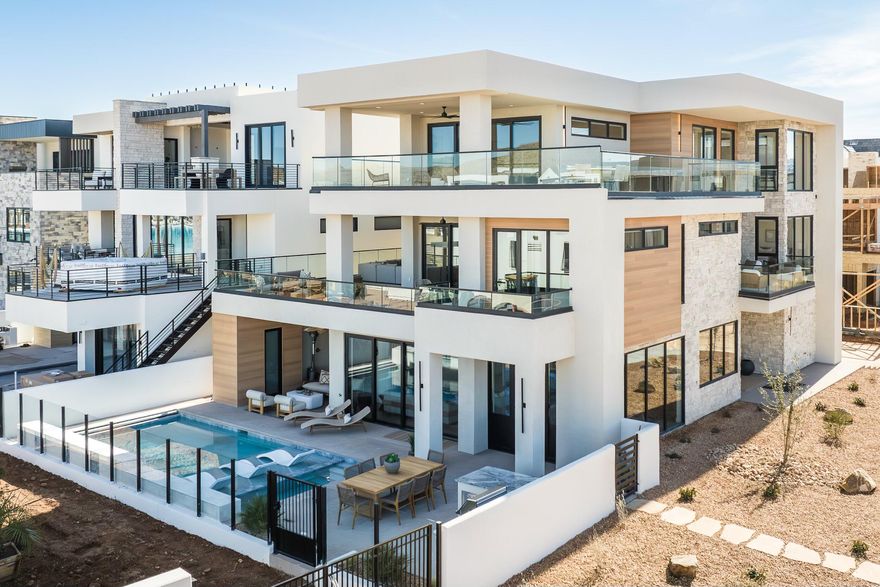 This Cameron Avarell Signature Designed home is literally one-of-a-kind! Built specifically for Co-Ownership and the Desert Color Community, it's a must see. Price listed is for a 1/8th Ownership. This home does allow for nightly rental!  In addition to the luxury design and finish, the home is 100% turnkey thanks to our award winning design teams outfitting the home top to bottom with high end decor, appliances and furniture. Yes, this Ember Co-Ownership Vacation home is bringing Boujee to the desert with the new way to own a luxury vacation property. The home features six bedrooms, all with ensuite bathrooms, sleeps 24, private pool and hot tub, theater room, 1500 sq feet of out door and above ground observation decks, outdoor shower, outdoor kitchen with grill, etc.

The price listed is for a 1/8th Ownership of the home. You would have access to the home for 44+ nights per year to use for person use, along with friends and family. Why pay for the entire home, when you only plan on being there 4-6 weeks a year? With Co-Ownership, you are offsetting your total cost of ownership by 87% with other like-minded Owners. The pictures are for illustration purposes only. Square footage figures are provided as a courtesy estimate only and were obtained from builder. Buyer is advised to obtain an independent measurement.