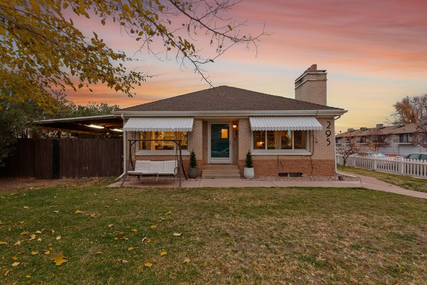Welcome to this adorable 4-bedroom home in the heart of downtown St. George, complete with a classic white picket fence and mature trees that create inviting curb appeal. Inside, you'll find new flooring throughout paired with a 1-year-old HVAC system, offering modern comfort while preserving the home's retro charm. The basement provides excellent flexibility. A rare two-car garage, uncommon in the downtown area, adds incredible value and convenience. Enjoy being just moments from downtown St. George's vibrant events, including local festivals, farmers markets, parades, and live entertainment, all right outside your door. **Sellers will remove anything hanging from the ceiling. Living room TV and mount is included. All other TV mounts are excluded. Fridge also included.
