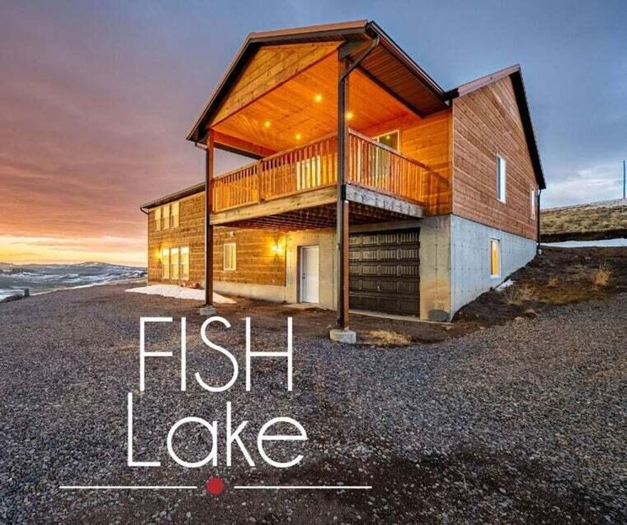 FISH LAKE!! Discover the benefits of this amazing nightly rental opportunity and the tranquility of mountain life with this picturesque property nestled in the landscapes of Fish Lake, Utah. The views are unparalleled from this beautiful, spacious home.  Featuring a unique blend of rustic charm and modern amenities, this 6-bedroom 3-bathroom stunner has an open-plan living area, where each space is perfectly designed for comfort and style.
Immerse yourself in scenic vistas visible from every window, with the property expansive, uninterrupted views over the rolling hills and verdant forests surrounding it. The kitchen is a chef's delight, equipped with stainless steel appliances, ample cabinet space, and a large kitchen island that doubles as a dining area. Outdoor enthusiasts will revel in the privacy and outdoor spaces, including a large deck perfect for entertaining or quiet contemplation. The property also includes a versatile game room with a pool table and plenty of space for indoor recreation. Located just a short drive from Fish Lake, known for its excellent fishing and nature trails, this home is ideal for vacationers seeking a peaceful retreat or a splendid full-time residence amidst nature's beauty. Experience staying in harmony with nature in this must-see property, where serenity meets comfort and style. Your guests will love it! If you leave any room in the calendar for them!