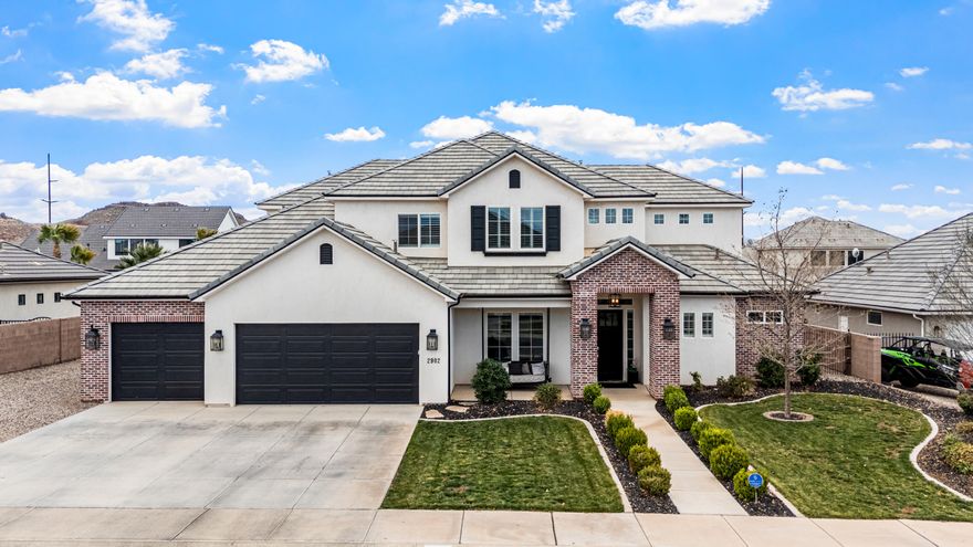 Beautifully maintained 5-bedroom + office home in The Arbors of St. George! Tucked on a quiet street yet just minutes from shopping, schools, and pickleball courts. This well-maintained 4,180 sqft home features hardwood flooring throughout the main level, an upgraded kitchen with upgraded cabinets, double ovens, and a hidden pantry, high-end shutters, and spacious living areas. Enjoy a 3-car garage plus convenient RV parking. The fully landscaped backyard offers an open canvas with plenty of room to add a pool and create your dream outdoor space. A rare combination of space, location, and pride of ownership in one of St. George's desirable neighborhoods.