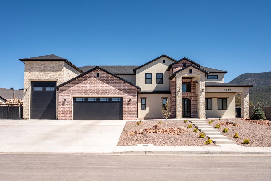 Incredible newer home in Saddleback Ridge featuring a rare oversized RV garage with attached workout room or workshop. This thoughtfully designed home offers 5 spacious bedrooms, including a main-level primary suite, and 3.5 baths with high-end finishes throughout. Enjoy custom cabinetry, a huge Butler's pantry, and stunning quartz countertops that open to a beautiful great room with a timeless stone fireplace. The luxurious primary suite includes a soaking tub, oversized walk-in shower, and dual vanities. Outside, you'll find a large RV parking area, block wall fencing, a fully landscaped yard, built-in gas fire pit, and breathtaking mountain views.