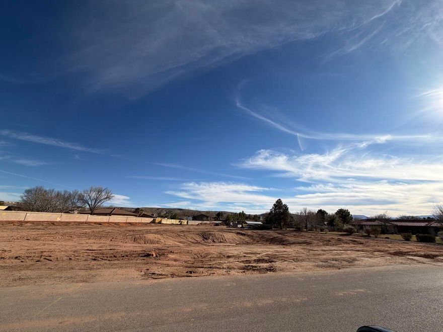 Discover one of the rare opportunities to own 1.15 acres on the highly desirable Sugar Leo Road -- where space, privacy, and freedom still exist.

This exceptional vacant lot offers the perfect canvas to build your custom dream home in one of St. George's most sought-after neighborhoods. With no HOA, irrigation water shares, and animal rights, you have the flexibility to design and build on your terms -- whether that's a luxury estate, a modern farmhouse, or a private desert retreat.

Just blocks from the Virgin River Trail, Bearclaw Poppy Trail, and minutes to Sand Hollow and Quail Creek Reservoirs, this location is ideal for cyclists of all types and outdoor recreation lovers.

The property includes 4 shares of valuable Bloomington irrigation water, a significant asset that enhances both usability and long-term value. Mature landscaping, gardens, hobby farming, or equestrian use become far more practical and affordable with these water rights in place.

Enjoy animal rights, wide open space, and the peaceful character that makes Sugar Leo Road so special. Here, you'll find the ideal balance of quiet country living while remaining just minutes from shopping, dining, schools, medical services, and outdoor recreation.

Opportunities like this are increasingly rare -- acreage, water shares, no HOA restrictions, and a premier location all in one property.

Build the lifestyle you've been waiting for.