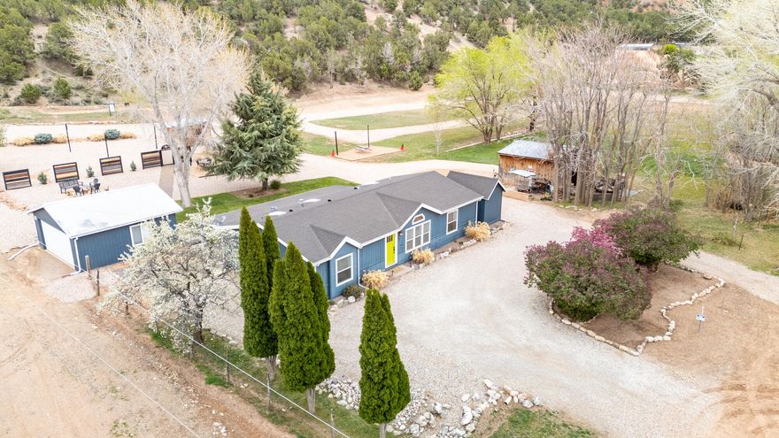 Located at the trailhead of the popular Kanarra Falls hike, this commercially zoned 3.6-acre property offers a unique blend of residential and commercial opportunity in one of Utah's most scenic locations. It includes a 3-bed, 2-bath home—ideal for an on-site owner or manager—plus multiple outbuildings to support a variety of uses. 14 ready-to-use campsites are in place with room to expand in so many different ways. Zoned for both commercial and residential use, permitted uses may include tent camping, glamping, small retail stores, walk-in eateries, etc. With world-class outdoor adventures right outside your door, the possibilities are endless!